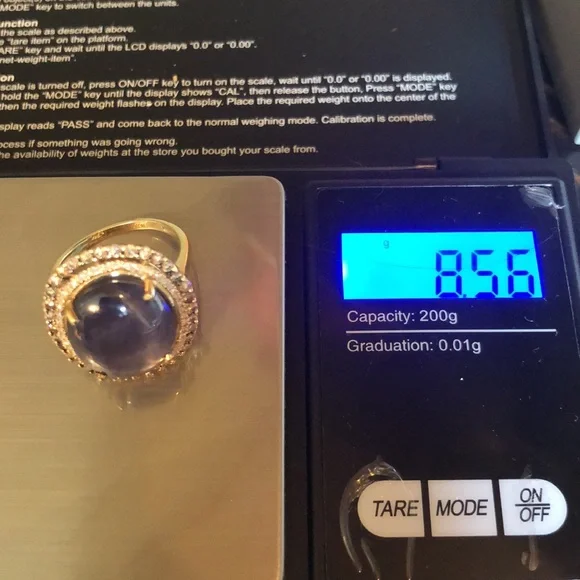 19 ct Star Sapphire surrounded by Diamonds in gold - Picture 15 of 15